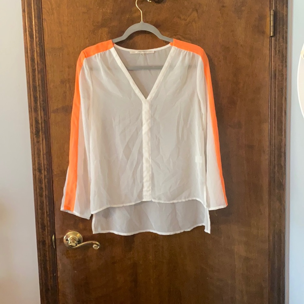 Sheer cream top with orange strip sleeve
